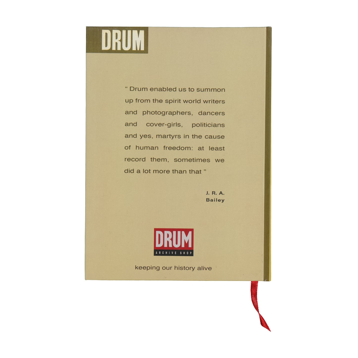 Book with text and DRUM logo on a beige background