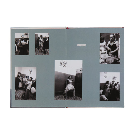 Open book with black and white photos of people in various poses on a light blue background