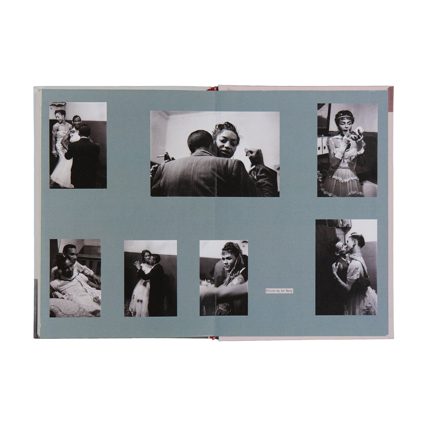 Collage of black and white photos in a photo album on a white background