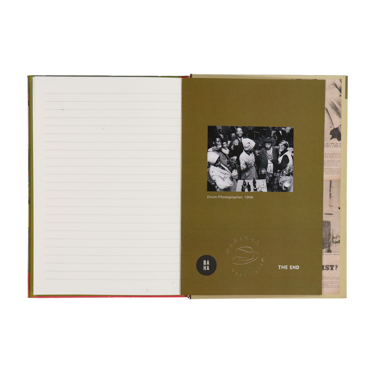 Open notebook with lined pages and a vintage-style cover featuring a black and white photo and text.