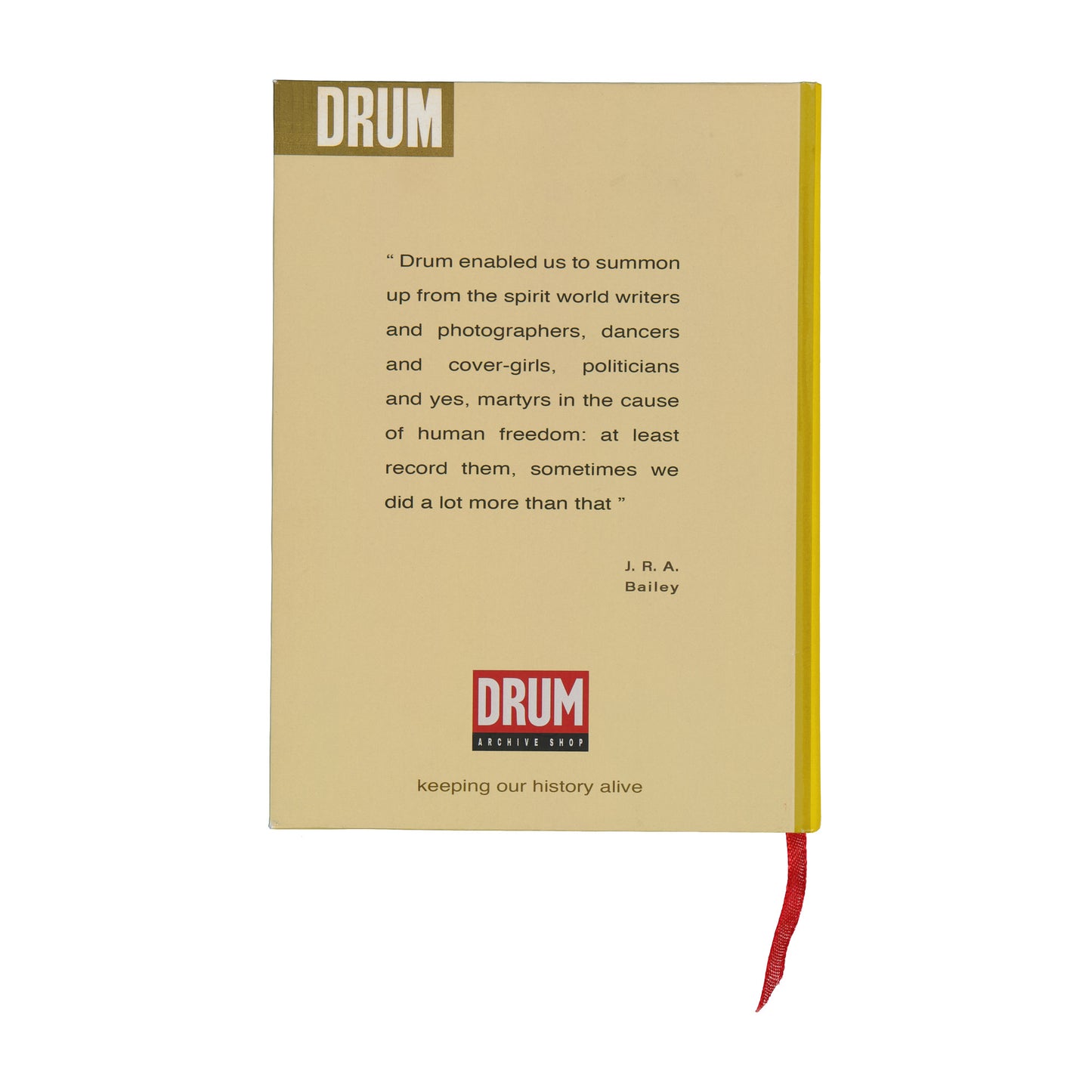 Book with a beige cover featuring text and a red ribbon on a white background