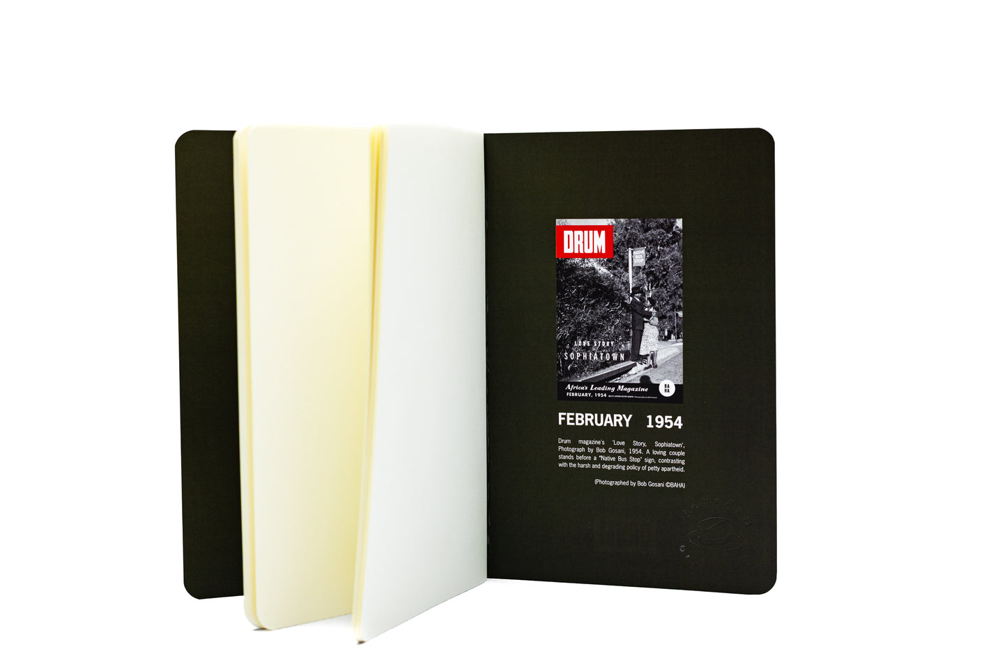 Black notebook with a DRUM logo on a white background