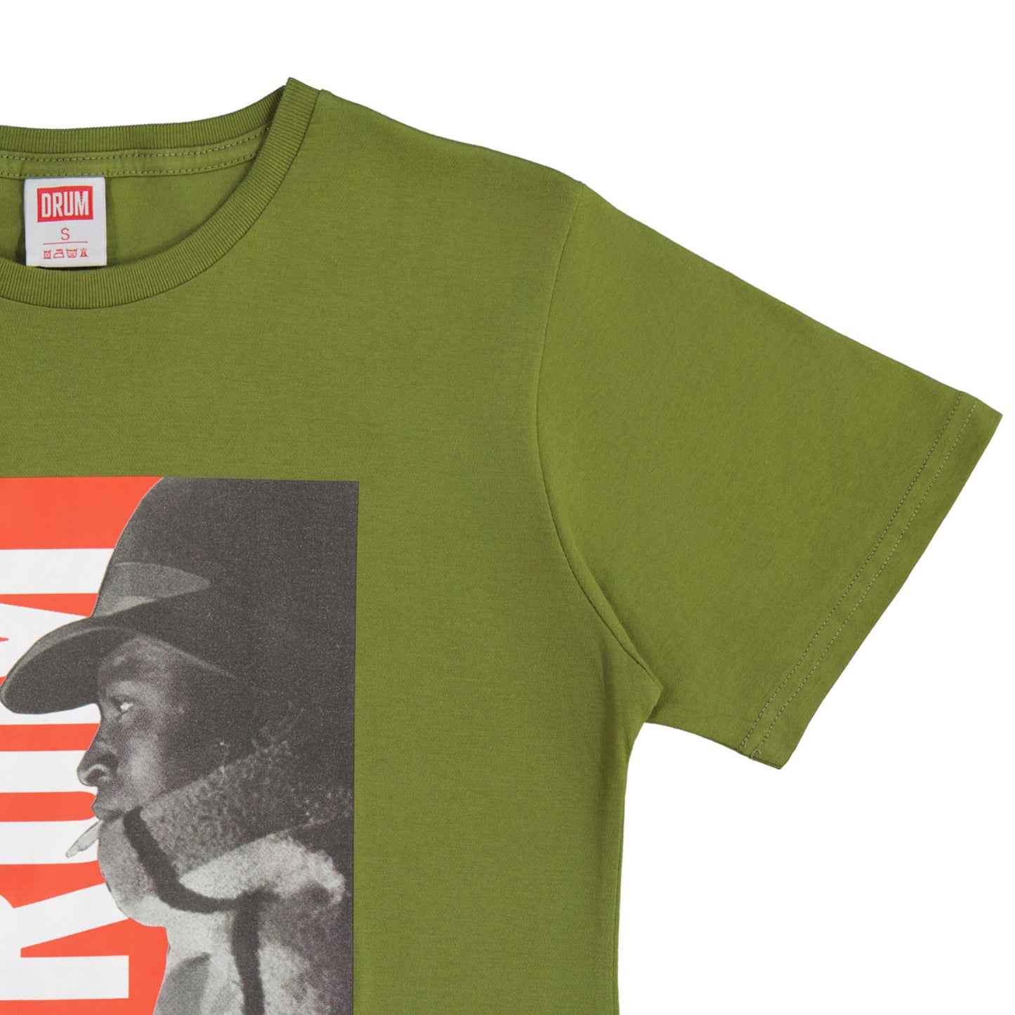 Green t-shirt with graphic design of a person wearing a hat and smoking a cigarette, on a white background.