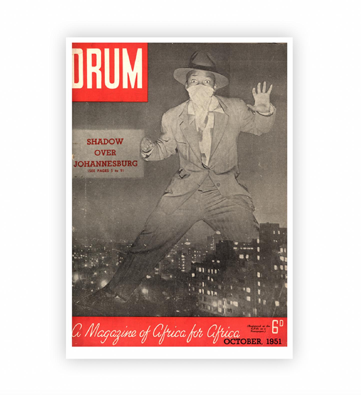 Vintage magazine cover with a man in a suit and hat, titled 'DRUM', featuring a Johannesburg Cityscape.