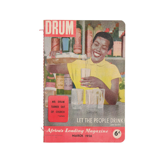 Notebook cover with a woman at a bar, featuring text and graphics.