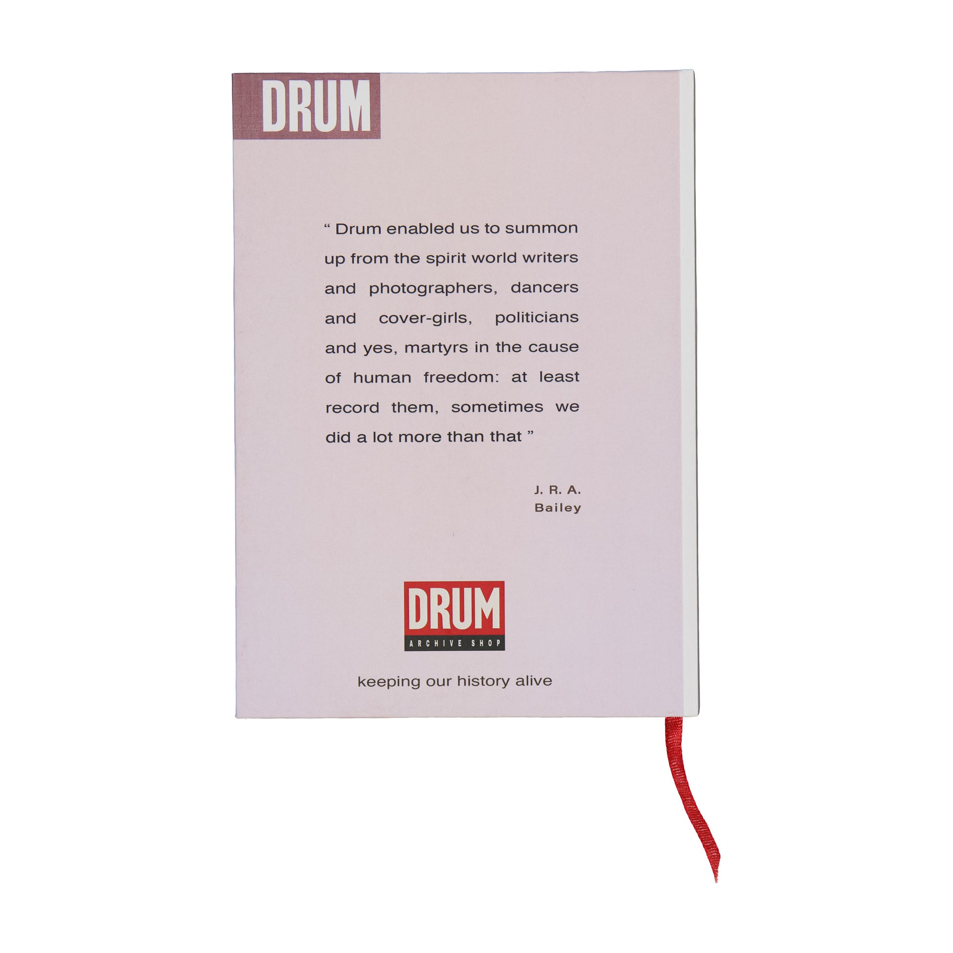 Book with text and 'DRUM' branding on a white background