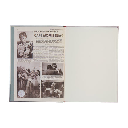 Open book with black and white photos and text on a white background