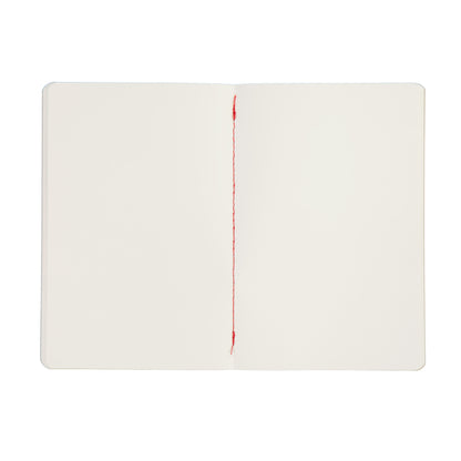 White notebook with red stitching on a white background