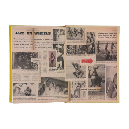 Open book with newspaper clippings titled 'Jazz on Wheels' on a white background