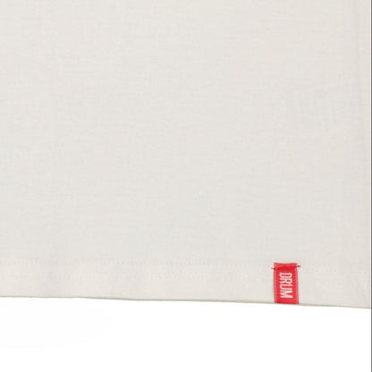 White surface with a red 'DRUM' label on a white background