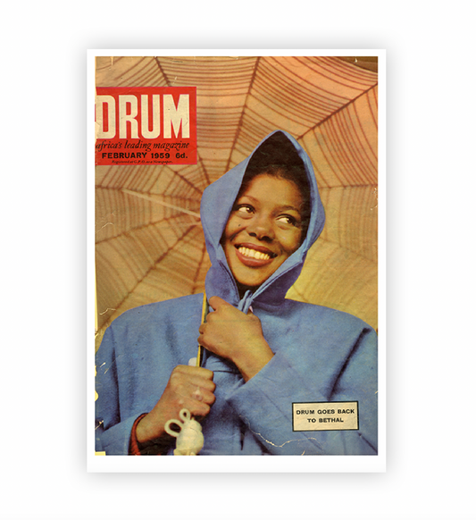 Vintage magazine cover with a person in a blue hooded coat holding an umbrella, featuring the 'DRUM' logo.