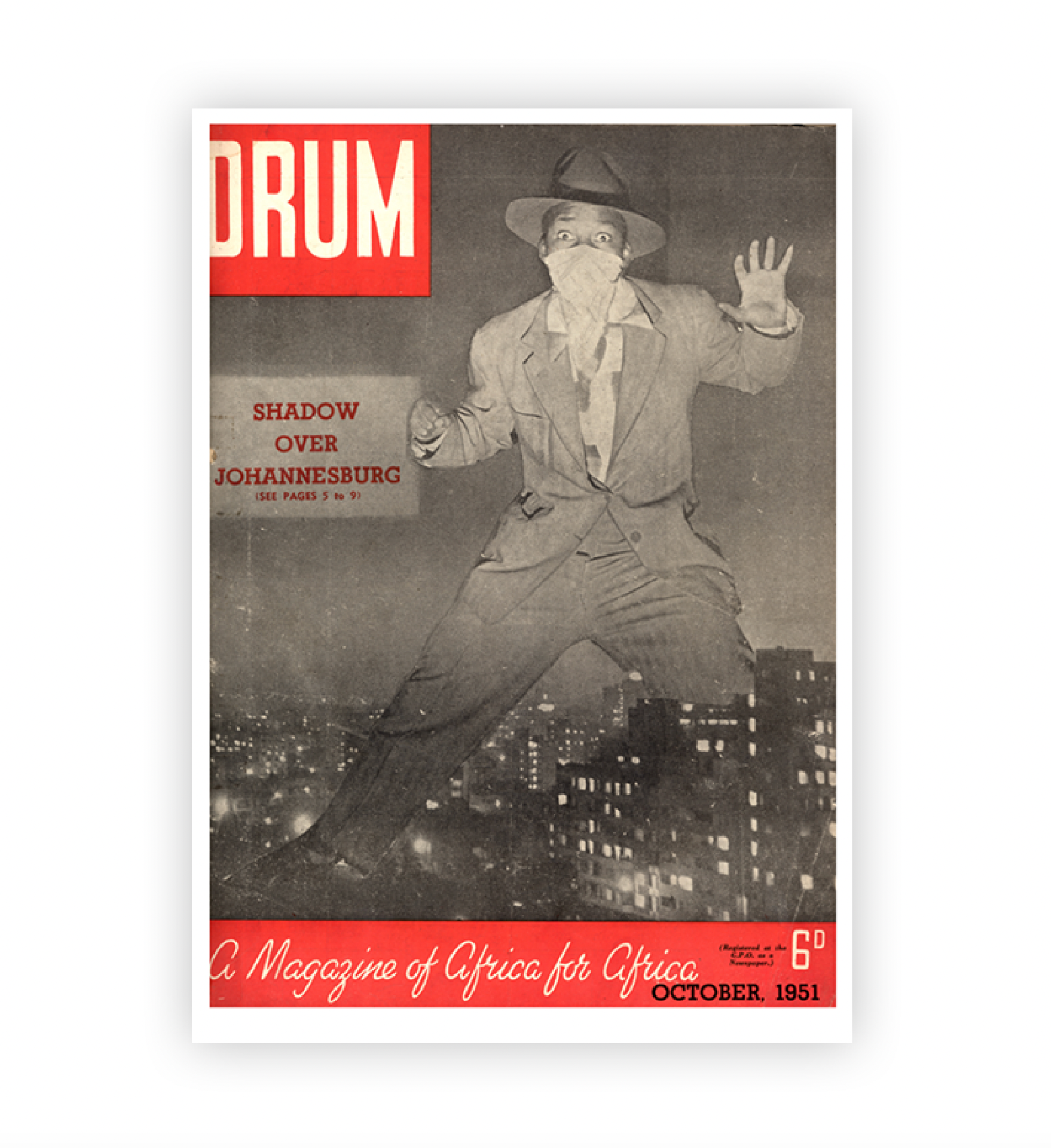 Vintage magazine cover with a man in a suit and hat, titled 'DRUM', featuring a Johannesburg Cityscape.