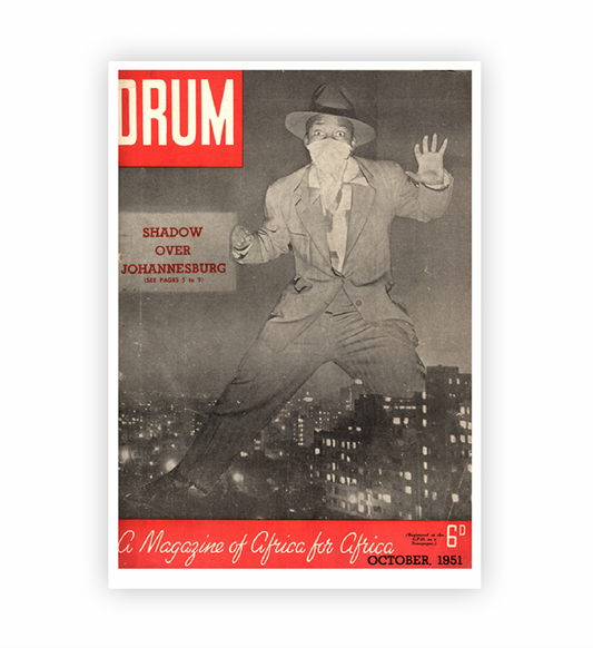Vintage magazine cover with a man in a suit and hat, titled 'DRUM', featuring a Johannesburg Cityscape.