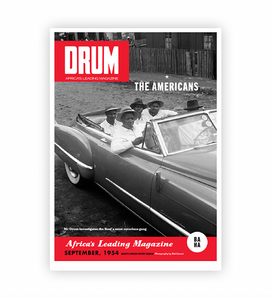 Magazine cover featuring a car with people and text about 'The Americans' from DRUM magazine.
